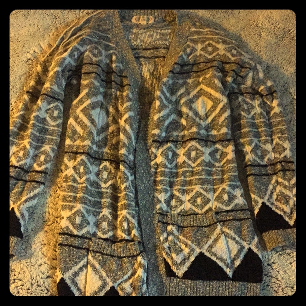 Gray sweater with black and white design